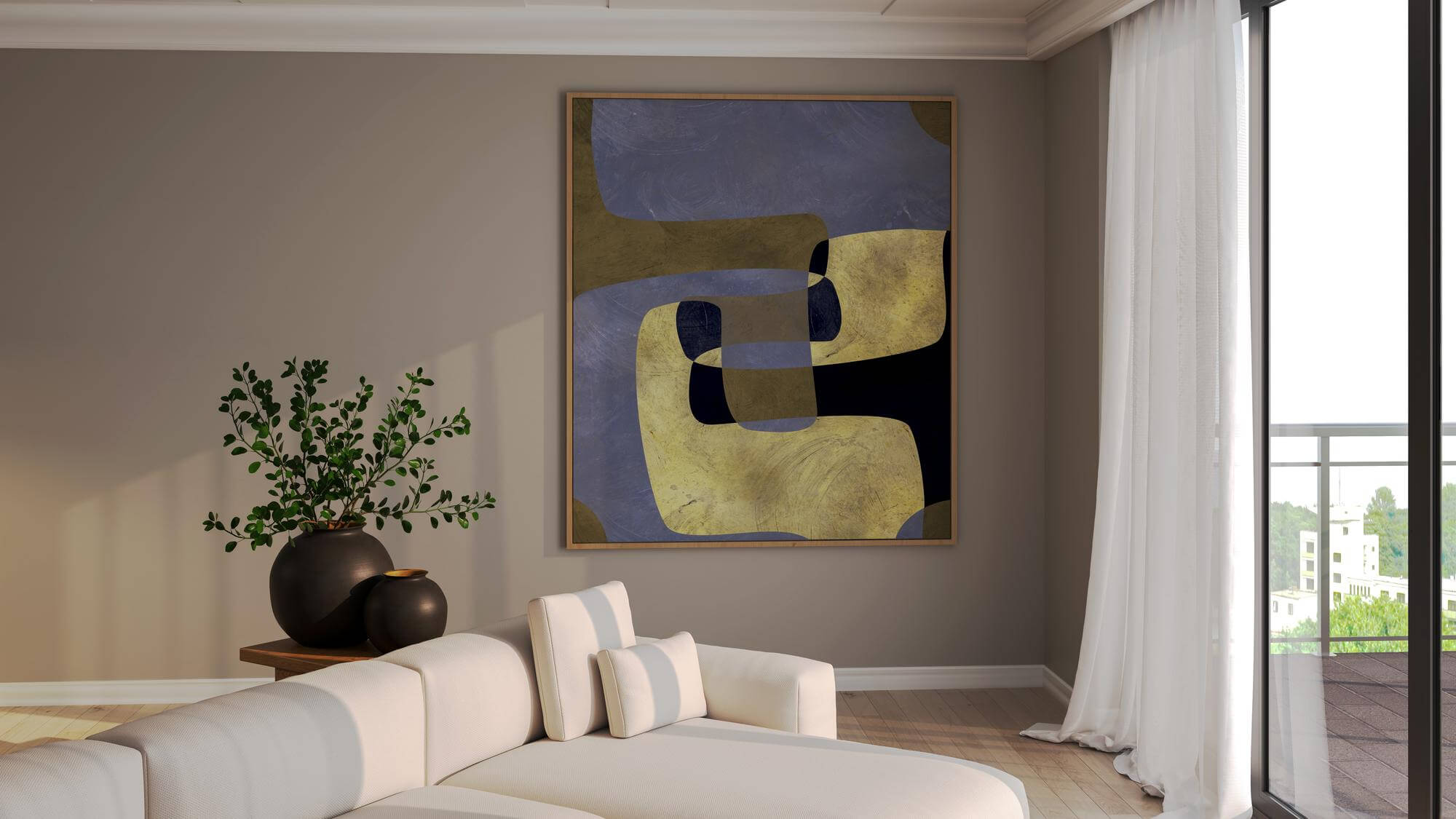 Sala com sofá branco e um quadro moderno